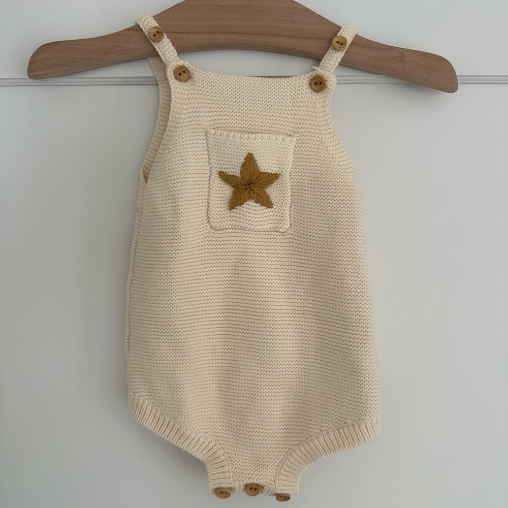 Adorable Cream Knit Baby Bodysuit with Star Accent